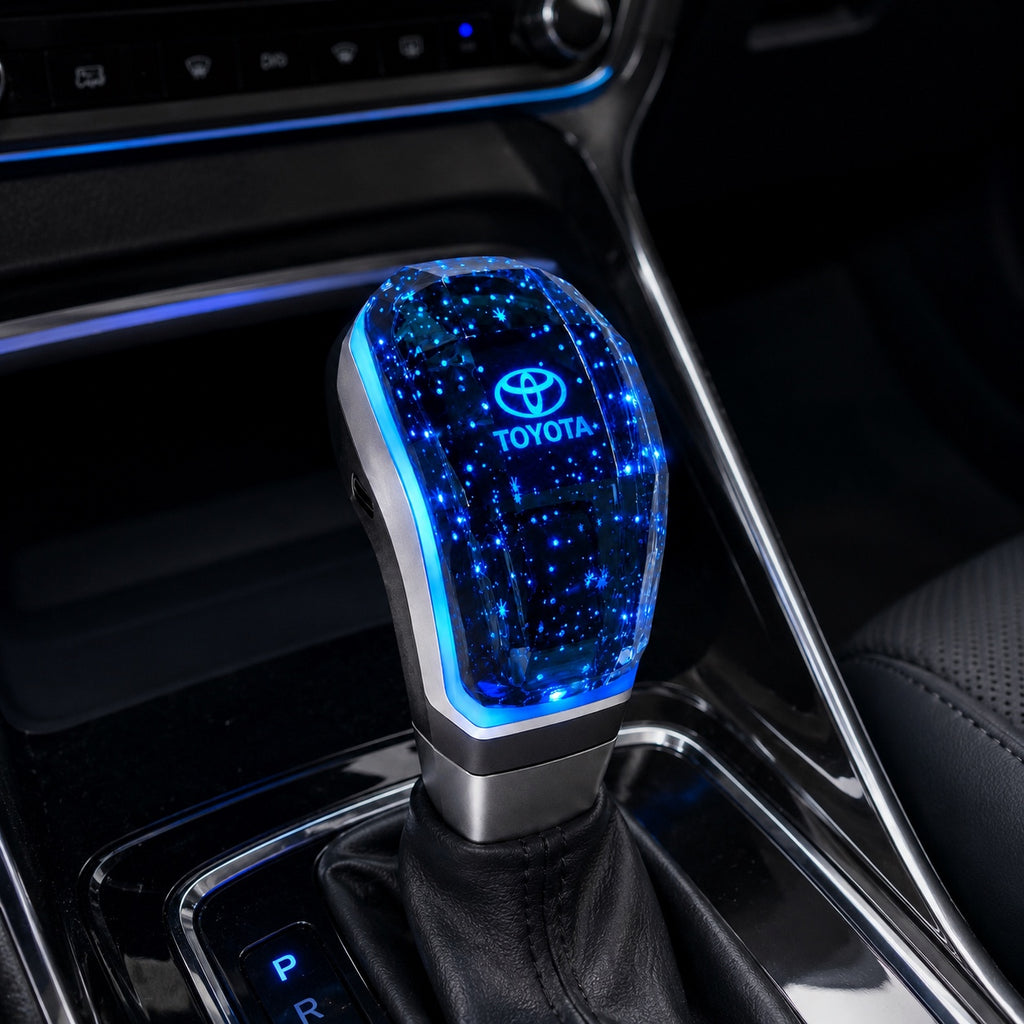 Crystal LED Toyota gear shift knob installed in a modern car interior with blue ambient lighting