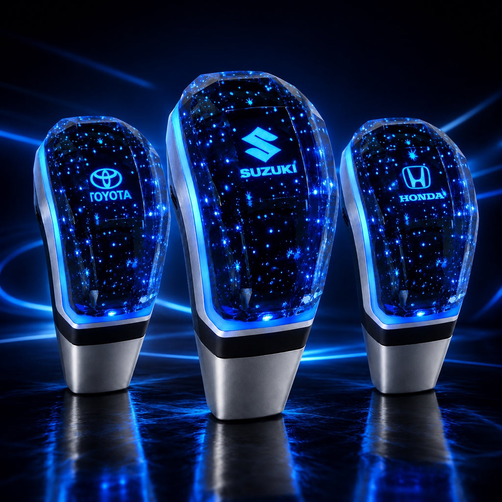 Crystal LED gear shift knob with Toyota, Suzuki and Honda logo variants on a dark blue automotive background