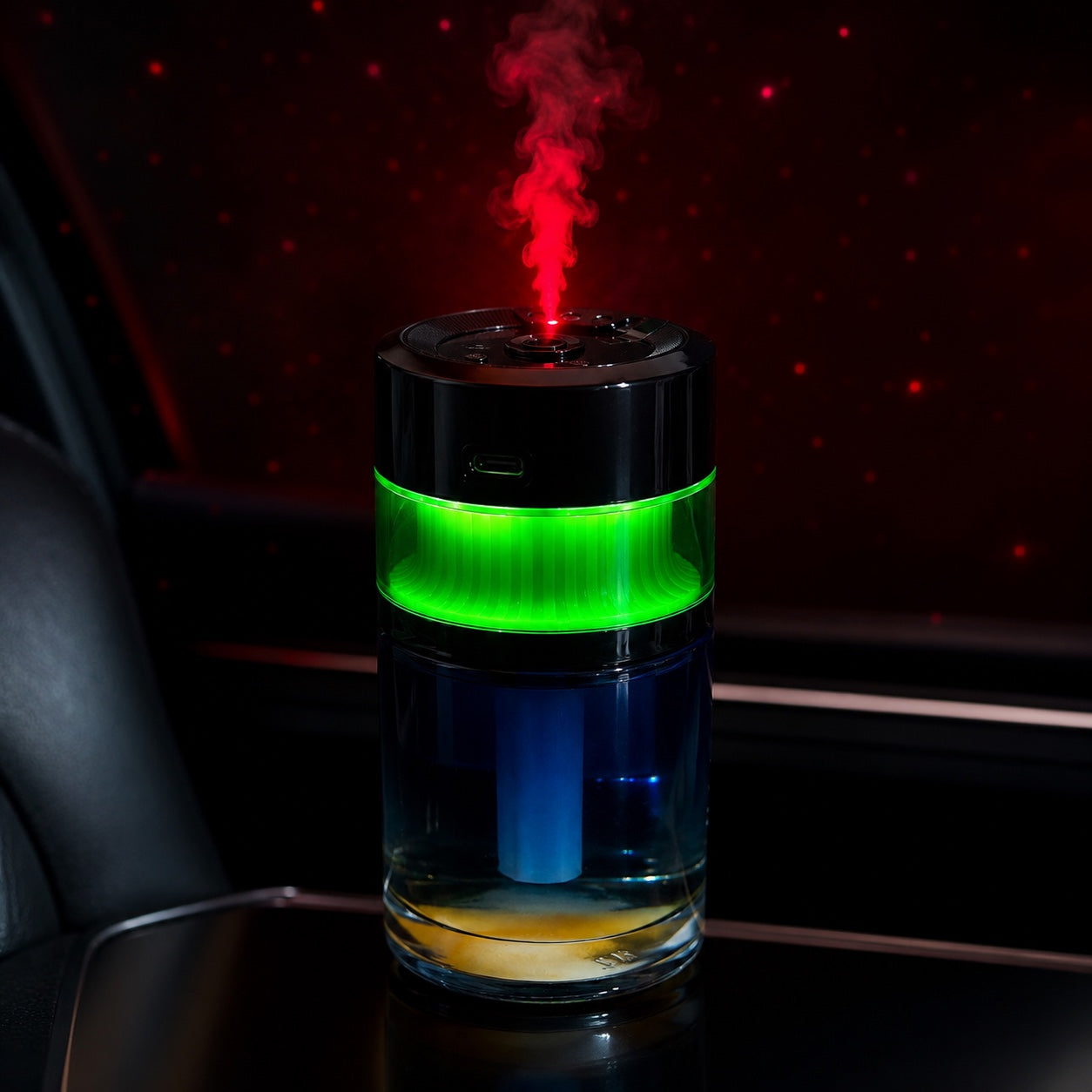 Rechargeable car aroma diffuser with red starry light projection and illuminated mist