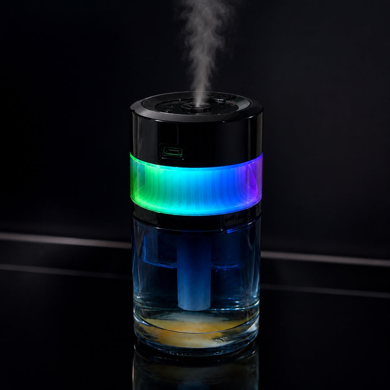Rechargeable starry sky car aroma diffuser producing mist with RGB ambient lighting