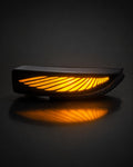 Wing style dual-color LED side mirror indicator illuminated in yellow