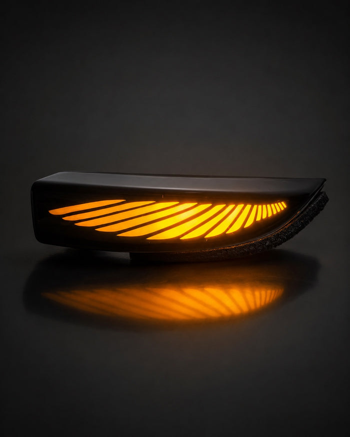 Wing style dual-color LED side mirror indicator illuminated in yellow